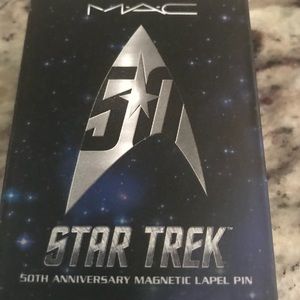 Collectible Star Trek lapel pin w/magnetic back.